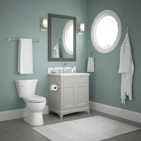 Slick SpotShield Brushed Nickel 4 Piece Bathroom Hardware Set With 18 To 24 Inch Adjustable Towel Bar and accessories in a bathroom