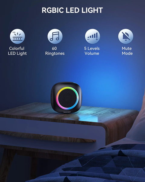 Ultra Long Range 1300 Feet Wireless Doorbell With RGB Alarm Lighting, Battery Powered, IP66 Waterproof, 60 Plus Chimes, 5 Level Volume, Portable Receiver For Home Office Classroom And Business, 4.5 Year Battery Life. RGB LED receiver on bedside table