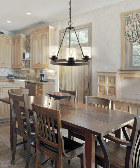 Oil Rubbed Bronze 20 Inch Three Light Rustic Farmhouse LED Chandelier With Wagon Wheel Design in dining room setting