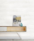 White reclaimed shiplap peel and stick wallpaper in a living room setting with decor for rentals and DIY decor.