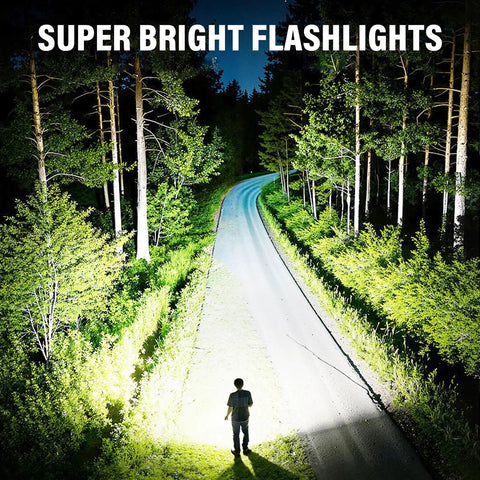 Person illuminating forest path at night using 4 Pack Rechargeable LED Flashlights With 990,000 Lumens Ultra Bright Go To Light.