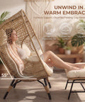 Oversized Double Egg Chair For Indoor And Outdoor Use With Thick Padded Cushions shown with person relaxing at 55 degree tilt