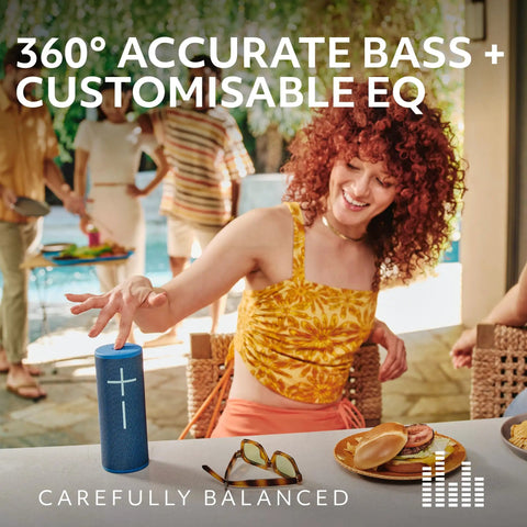 Woman enjoying Boom 4 Portable Waterproof Bluetooth Speaker With 360 Degree Sound Crystal Clear Audio And Bass at a poolside gathering