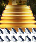 Solar LED Step Lights For Outdoor Stairs Waterproof IP67 Weatherproof Dope Warm White Deck Lights 12 Pack For Yard Patio Garden Walkways Front Door Pathway Driveway Porch illuminating steps.