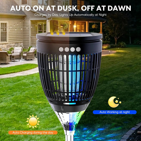 3 In 1 Bug Zapper For Outdoors Solar Powered With Realistic Flame Light And RGB Projector installed in a garden.