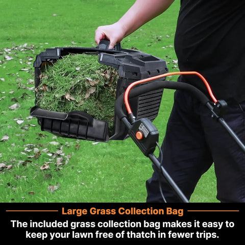 Person holding grass-filled collection bag attached to Cordless 13-Inch Lawn Mower With 24V Max Power, Two 4.0Ah Batteries And Charger