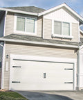 House with white garage door featuring Steel Garage Door Decorative Hinges, Handles And Accents Hardware Kit with black finish.