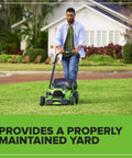 Person using a GreenWorks mower on lawn with the Replacement 21 Inch Mower Blade For 80V And 60V Cordless Lawn Mowers Beefy Black Finish Sharp Cut Easy Install Fits a Wide Range of 21 Inch Deck Mowers For Faster Yard Work installed.