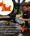 Man using Bike Handlebar Repair Stand Universal Bicycle Maintenance Holder For Home Garage Inverted Setup in outdoor setting