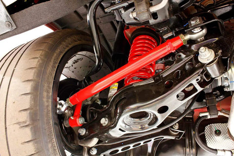 Rear Adjustable Toe Rod Kit With Spherical Rod Ends And Red Powder Coat For Chevy Camaro 2016 undercarriage view.