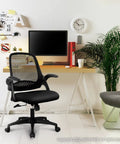 Ergonomic office and gaming chair with lumbar support in home office setting with desk and computer, breathable mesh back, black color