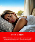 Woman sleeping peacefully on a bed under a white comforter with a patterned pillow, suggesting comfort and safety at home.