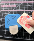 Corner Rounder Punch 3 In 1 R4mm R7mm R10mm for crafting displayed on cutting mat with floral card example