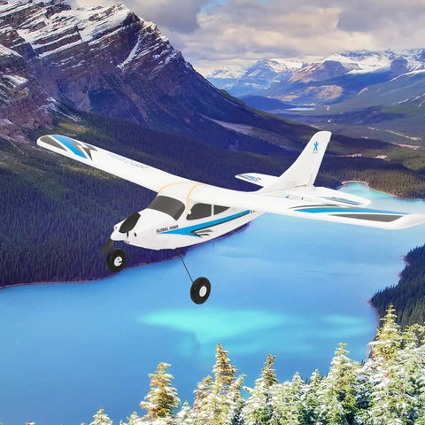 RC Seaplane Trainer With Floats Included, 2.4 GHz 1.2m Grab And Go Ready To Fly Aircraft soaring over mountain lake