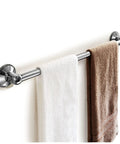 Insta Mount 24 Inch Towel Bar No Tools No Drilling Mounts Anywhere with chrome finish, holding white and brown towels on wall.