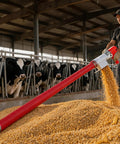 Man operating Heavy Duty Portable Grain Suction Auger Screw Conveyor With 16 Ft Flexible Hose for transferring feed.