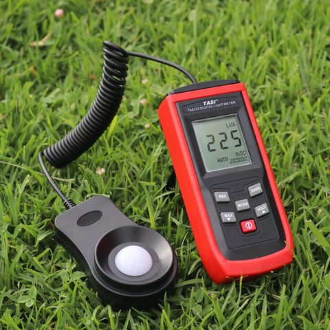 Easy-Read Pro-Grade Digital Lux Meter For Photography And Studio Lighting, Measures 0 To 200000 Lux (Lux/FC) With Clear Readout, Ideal For Photo Shoots, Office, Lab, Stage, And Horticulture Lighting Control, red handheld meter on grass