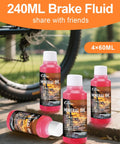 Road Ready All In One Brake Bleed Kit For Hydraulic Disc Brakes Compatible With Shimano TEKTRO And TRP Includes 240 Ml Mineral Oil Fluid In Four 60 Ml Bottles Clear Funnel And Simple Step By Step Instructions, showing four mineral oil bottles near a bike wheel.