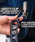 Hand securing Rear Transom Boat Trailer Straps Ratchet Tie Downs 1.5 Inch By 4 Foot Heavy Duty Pair With PVC Hooks For Trailered Boats