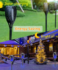 Blue Flickering Flame Solar Torches Lights 4 Pack For Outdoor Yard Garden Waterproof Pathway Patio Decor Easy Solar Powered Night Lighting display of torches installed in a garden area during day and night.