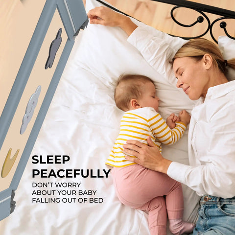Mother and baby sleeping next to adjustable foldable toddler bed rail for safe sleep with strong lock