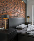 Dope 22-Inch Table Lamp With Dual Pull Chains in bedroom setting, industrial dark gray metal finish on nightstands near bed.