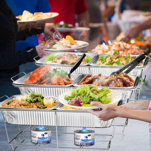 Chafing Wire Rack Buffet Stand 12 Pack Full Size Racks For Dish Serving Trays And Food Warmers in use at a party