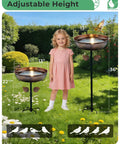 Metal Bird Bath For Outdoors 36 Inch Tall Stake With Removable 13 Inch Diameter Bowl And 3 Inch Deep Basin in garden setting.