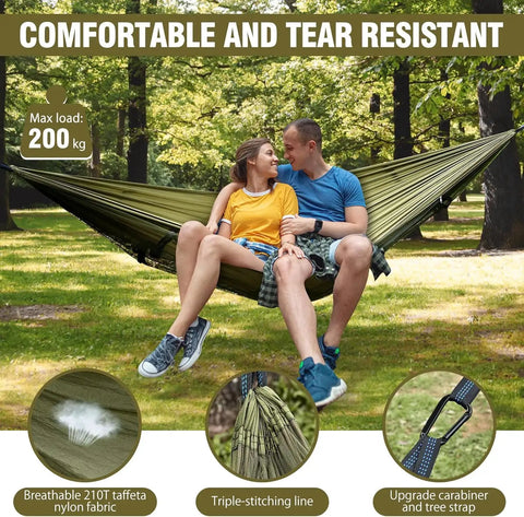 Couple relaxing in mosquito net camping hammock with lightweight parachute nylon, double or single setup, two tree straps