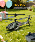 RC Helicopter For Beginners With Altitude Hold Gyro Stabilization And LED Lights, Kid Friendly Remote Control Toy With 2 Batteries And USB C Charging, Totally Beginner Friendly Gift For Boys Ages 8 To 12, Green, shown outdoors with remote and gift boxes.