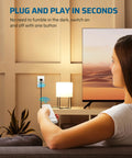 User operating Long Range Remote Control Outlet Kit With 5 Outlets And 2 Remotes for indoor power switch, lamp control visible