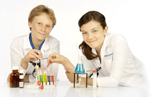 Children using Advanced Chemistry Lab Kit With Test Tubes Beakers Flasks And Dozens Of Chemicals For 333 Experiments For Serious Scientists