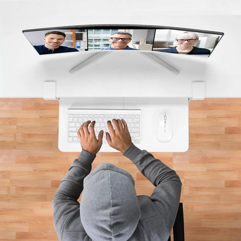 Top view of person using a full-size keyboard and mouse on an Under Desk Keyboard Tray With Clamp On Mount 19.7 By 11.81 Inches.