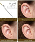 Gold Zircon Nose Studs 20 Piece Set Dope Threadless Flat Back Nose Jewelry 18G 20G With Tapered Insertion Pin shown in use on ear