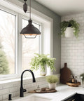 Sequoia 13 Inch Dope Industrial Pulley Pendant Light With Dome Shade And Counterweight In Oil Rubbed Bronze Finish over kitchen sink