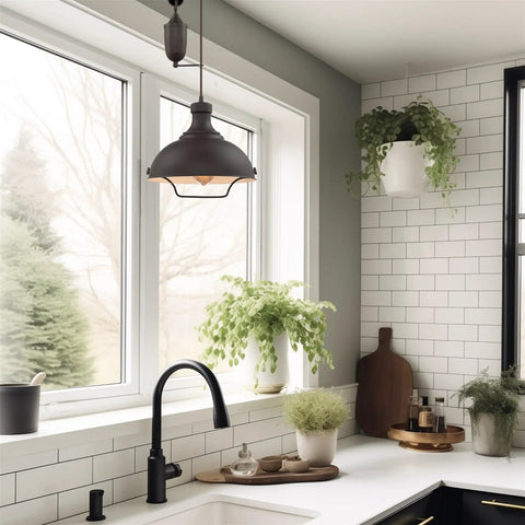 Sequoia 13 Inch Dope Industrial Pulley Pendant Light With Dome Shade And Counterweight In Oil Rubbed Bronze Finish over kitchen sink