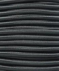 Close-up of black Durable Paracord Bungee Elastic Nylon Shock Cord Quarter Inch By 500 Feet Black Made In USA For Securing Gear Camping