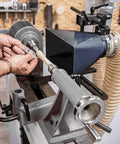 Heavy Duty Universal Woodturning Dust Hood featuring fully adjustable bracket and 100 millimeter hose connector in workshop.