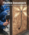User utilizing 10ft articulating borescope for mechanics and HVAC inspections two way camera probe lets you steer in tight spaces.