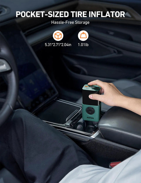 Person placing Portable Cordless Tire Inflator On The Go with Digital Dual Display LED Lights in car cup holder