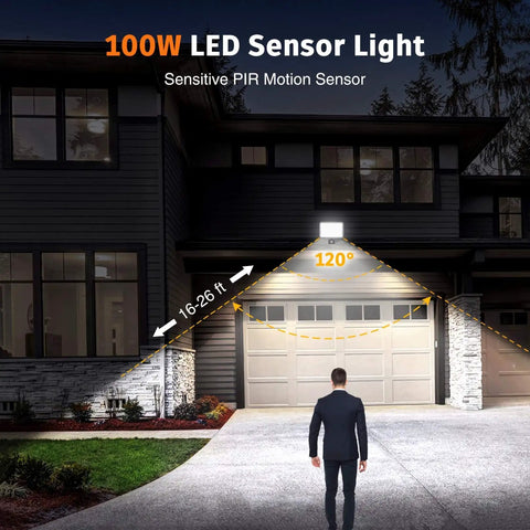 100W Led Floodlights with Motion Sensor, 6000K-6500K Daylight White 80 illuminating a driveway area.