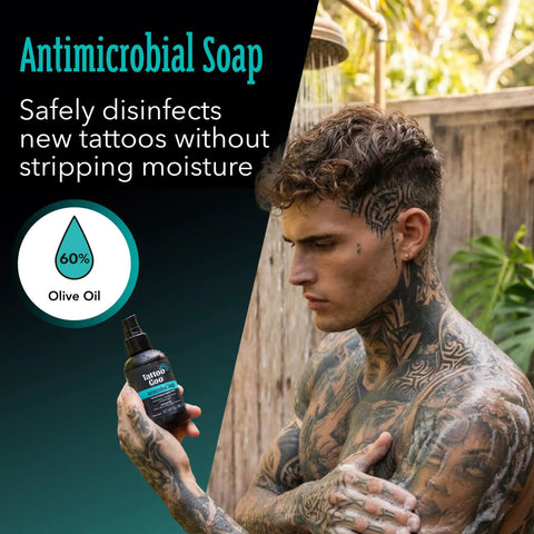 Man with tattoos using Antimicrobial Soap from Tattoo Aftercare Kit 3 Piece Set With Antimicrobial Soap, Tattoo Balm, And Healing Lotion For Fresh Ink, Color Preservation, And Ongoing Ink Maintenance Plus Piercing Care