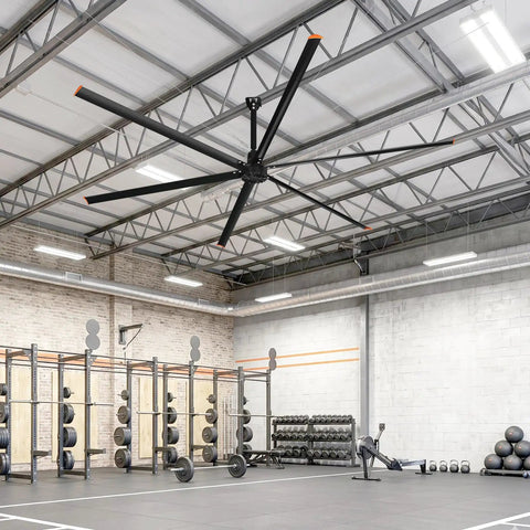Straight Up Heavy Duty 14 Foot Commercial HVLS Industrial Ceiling Fan With Six Sturdy Aluminum Blades Packing Serious Airflow To Keep Warehouses Shops And Barns Chillin Season Long mounted in a gym.