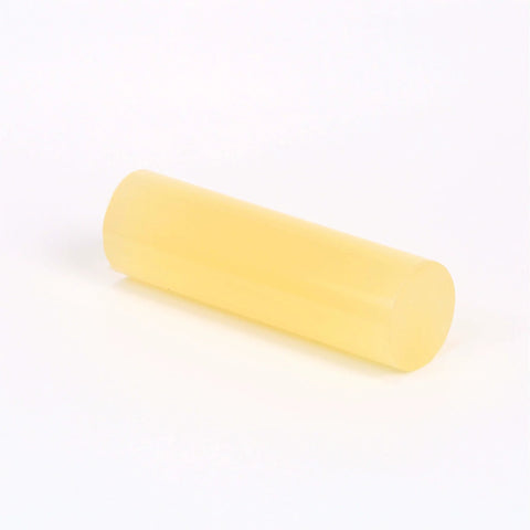 Hot melt adhesive stick 3738 TC, tan, 5/8 in x 2 in, 100% solids, extended open time for woodworking displayed on white background.