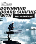 Man on Inflatable Downwind Surfing SUP 135L AeroBlade Edition with foil and paddle, gliding on water, surrounded by snowy landscape.