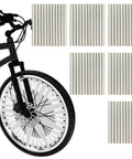Bicycle front wheel with 72 Pcs Bicycle Spoke Reflective Strips For Night Riding 360 Degree Visibility shown alongside packaging.