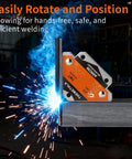 Front view of magnetic welding holder on steel beam; orange and silver, 25 lb holding capacity.