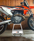 Beefy Dirt Bike Stand With 1100 LB Load Capacity And 16 Inch Universal Fit Lift Heavy Duty Non Slip Off Road Steel Maintenance Stand For Motorcycle And Powersports supporting an off-road bike
