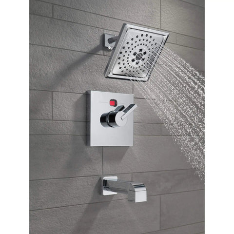 Ara Tub Spout Chrome With Pull Up Diverter, 5.5 Inch Reach, shown installed in modern bathroom, chrome finish, water flowing from shower