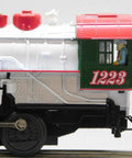Side view of Winter Wonderland LionChief Steam Locomotive Engine for O Gauge, featuring detailed wheels and cab, 2323100-E.
